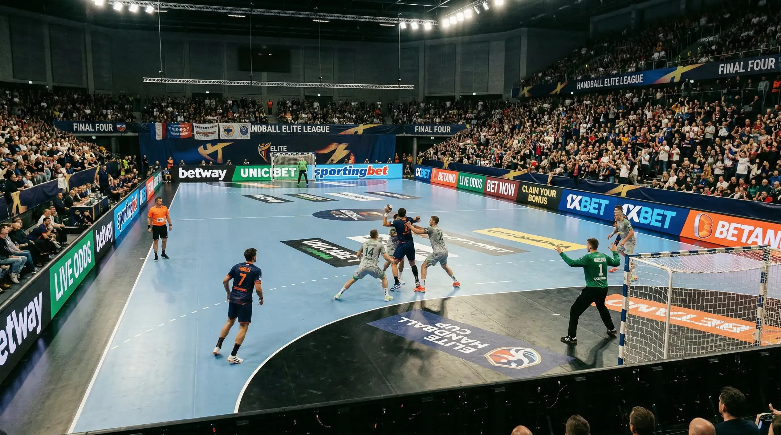 Panneaux publicitaires de paris sportifs autour d'un terrain de handball lors d'un match